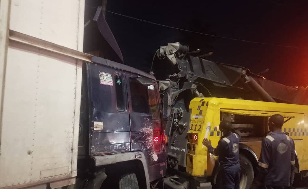 Four killed, 16 injured as container truck overturns on bus in Lagos